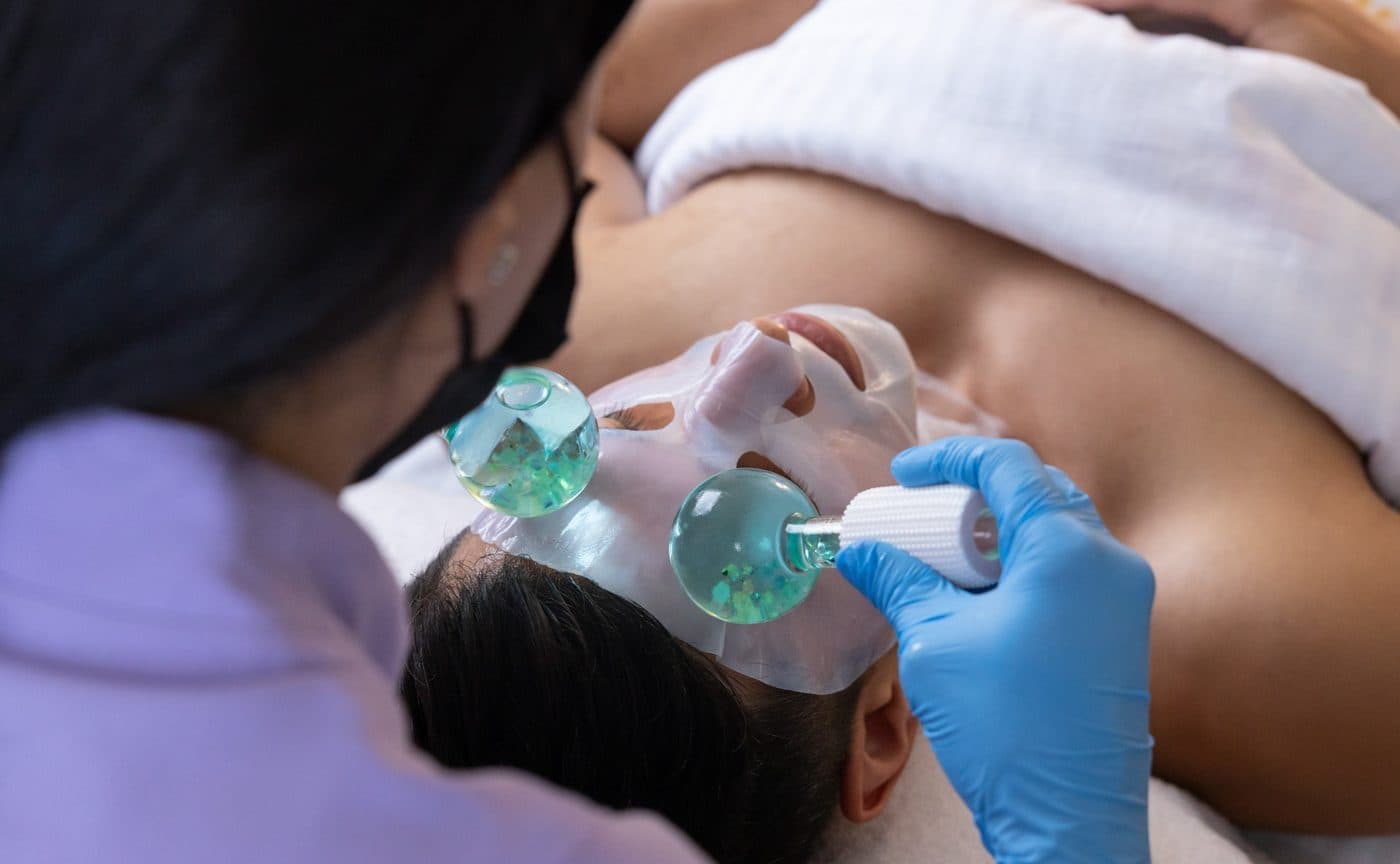 A facial in progress in a calm OC Skin Care Center treatment room